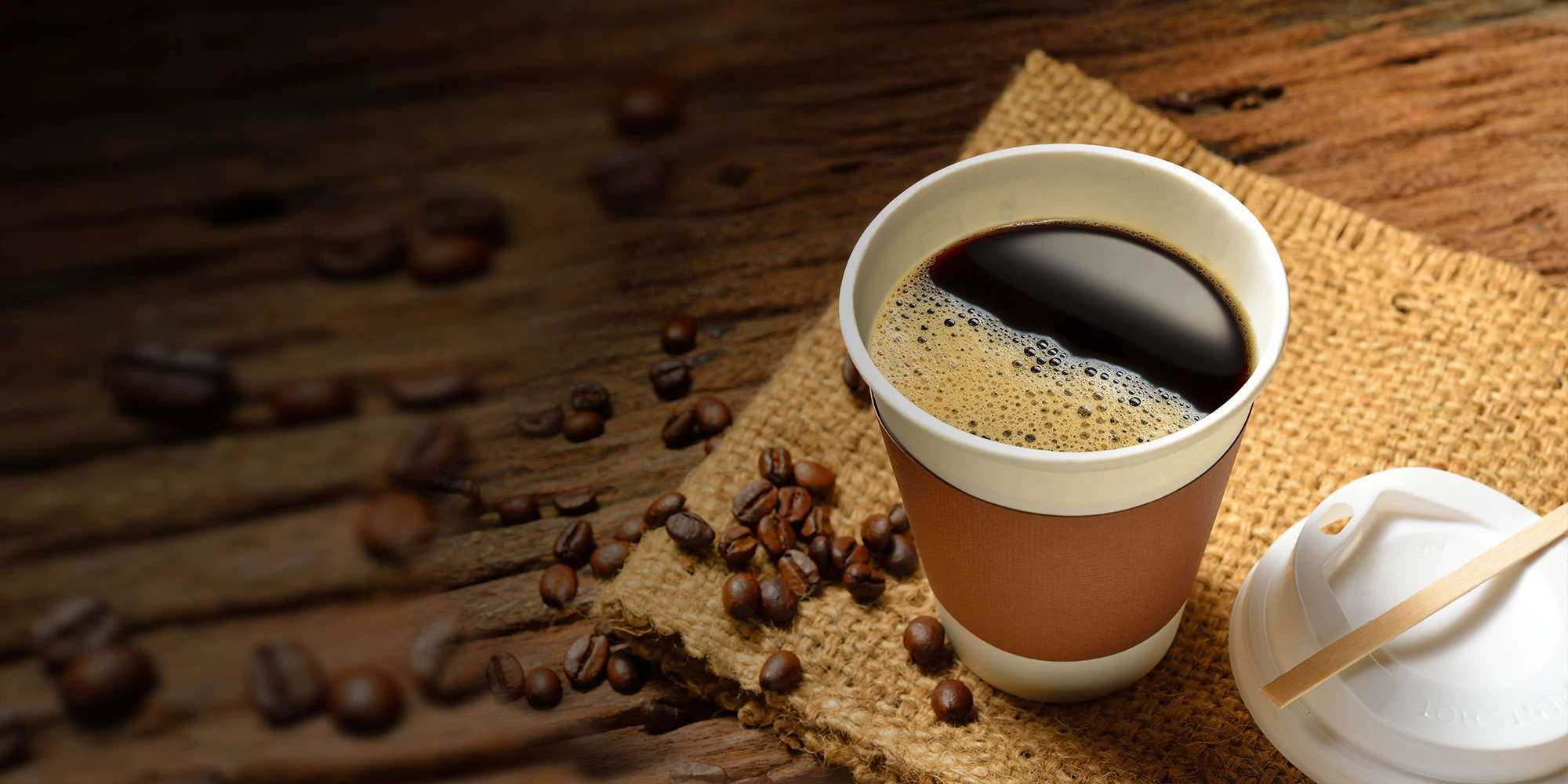 Hot cup of fresh coffee on an office table